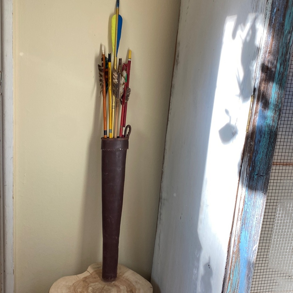 Assorted Vintage arrows and leather quiver